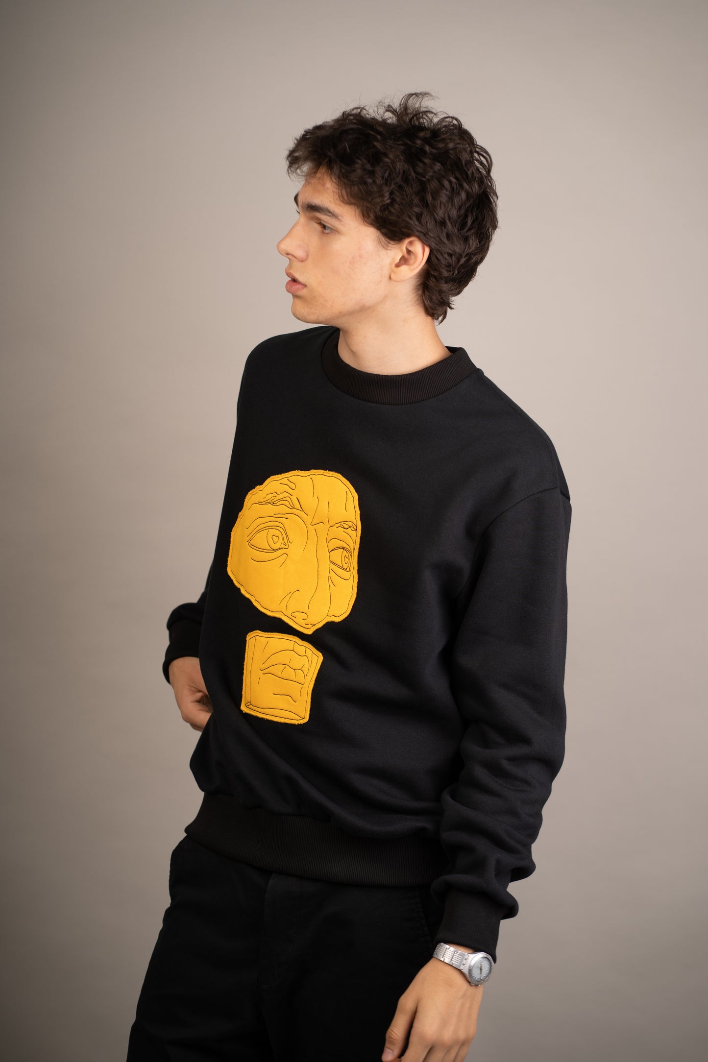 Men's graphic sweatshirt with face detail embroidery