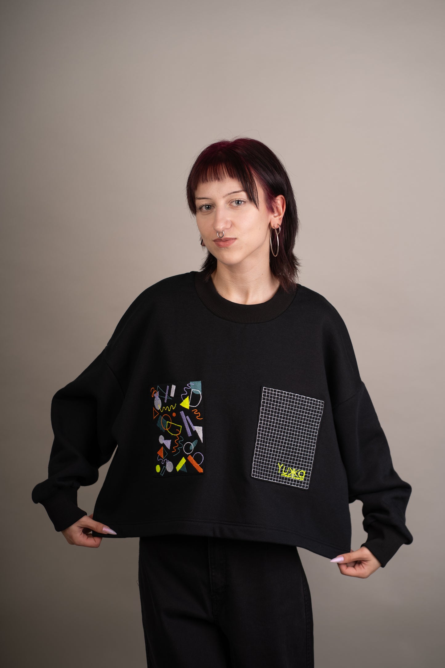 Women's graphic sweatshirt with funky embroidery on pockets