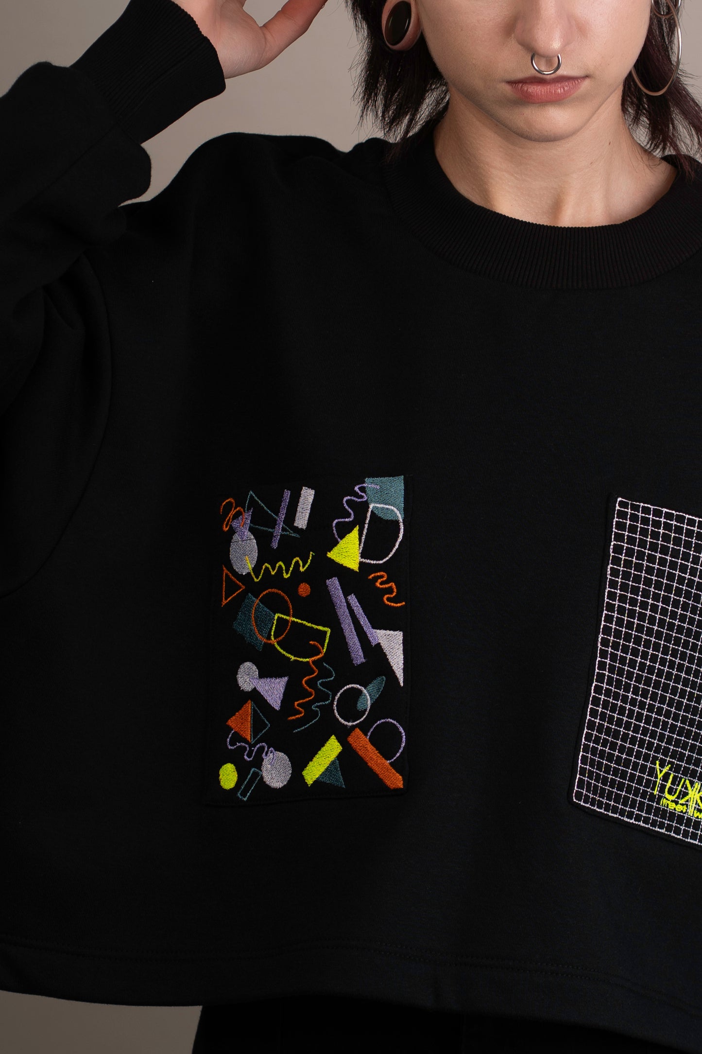 Women's graphic sweatshirt with funky embroidery on pockets