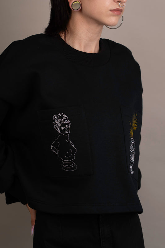 Women's graphic sweatshirt with vase and statue embroidery