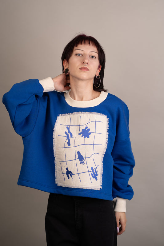 Women's graphic sweatshirt with abstract embroidery