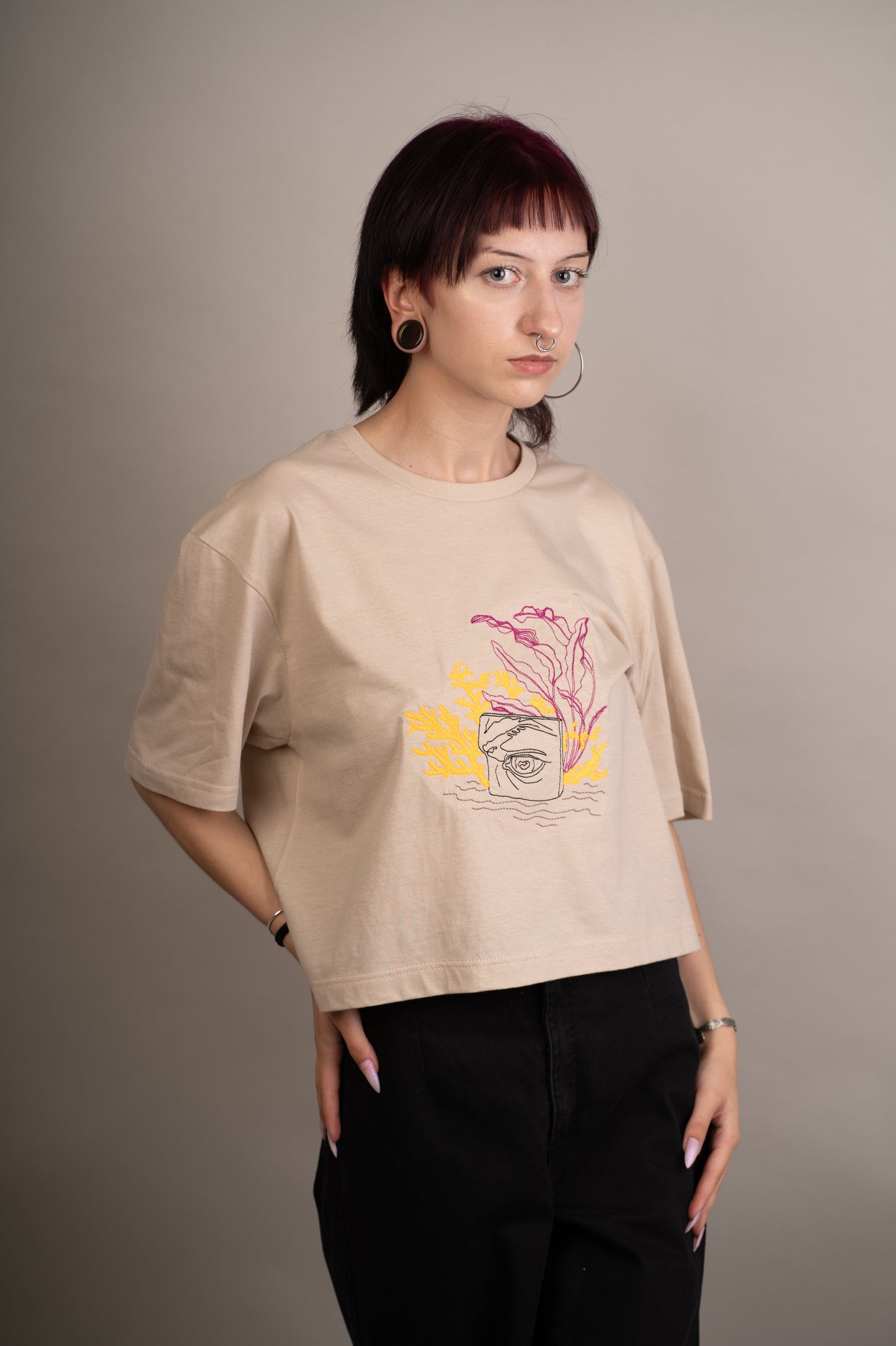 Women's graphic crop top with eye detail