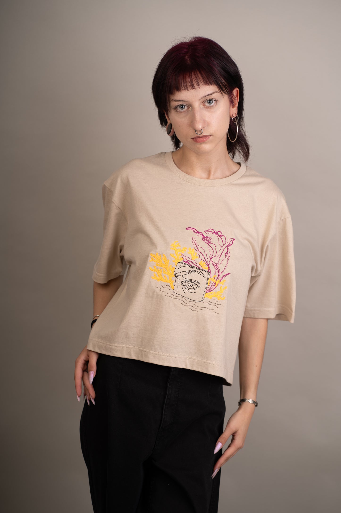 Women's graphic crop top with eye detail