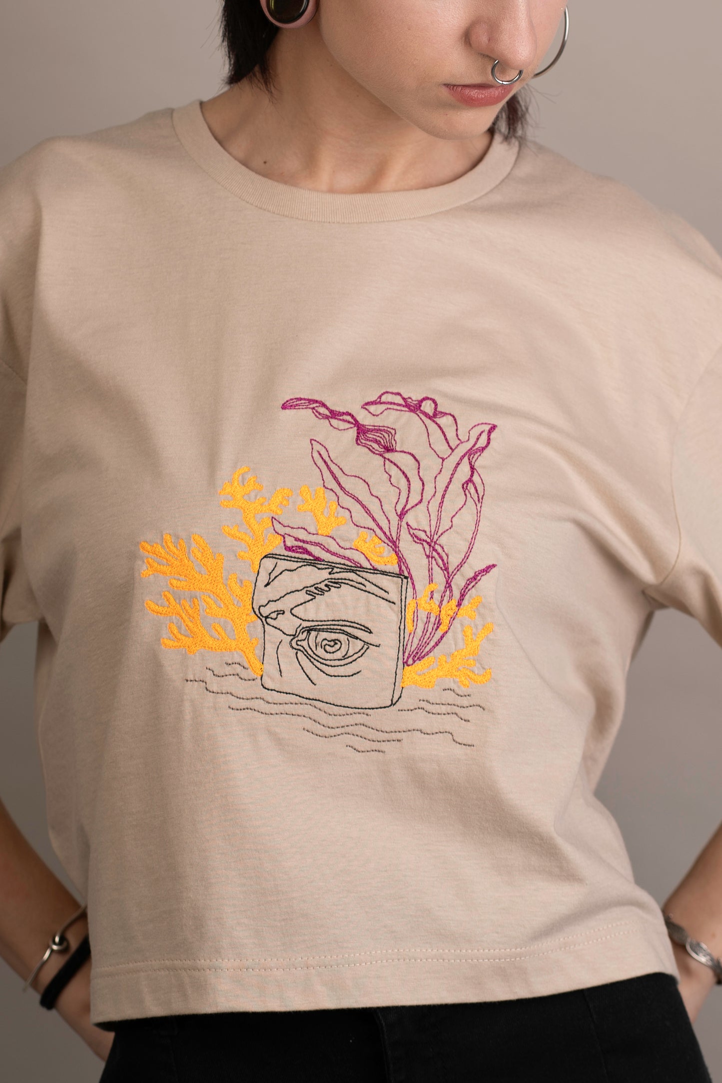 Women's graphic crop top with eye detail