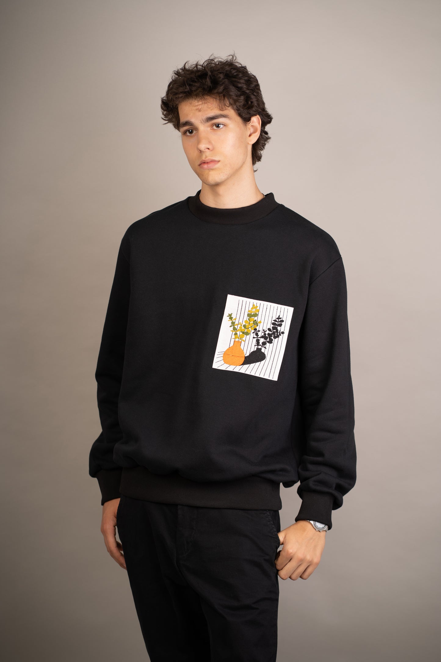 Men's black sweatshirt with still life embroidery on pocket