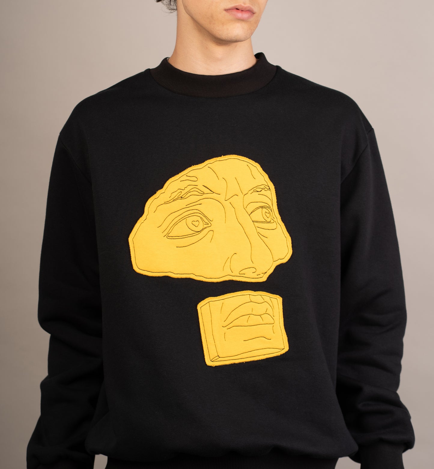 Men's graphic sweatshirt with face detail embroidery