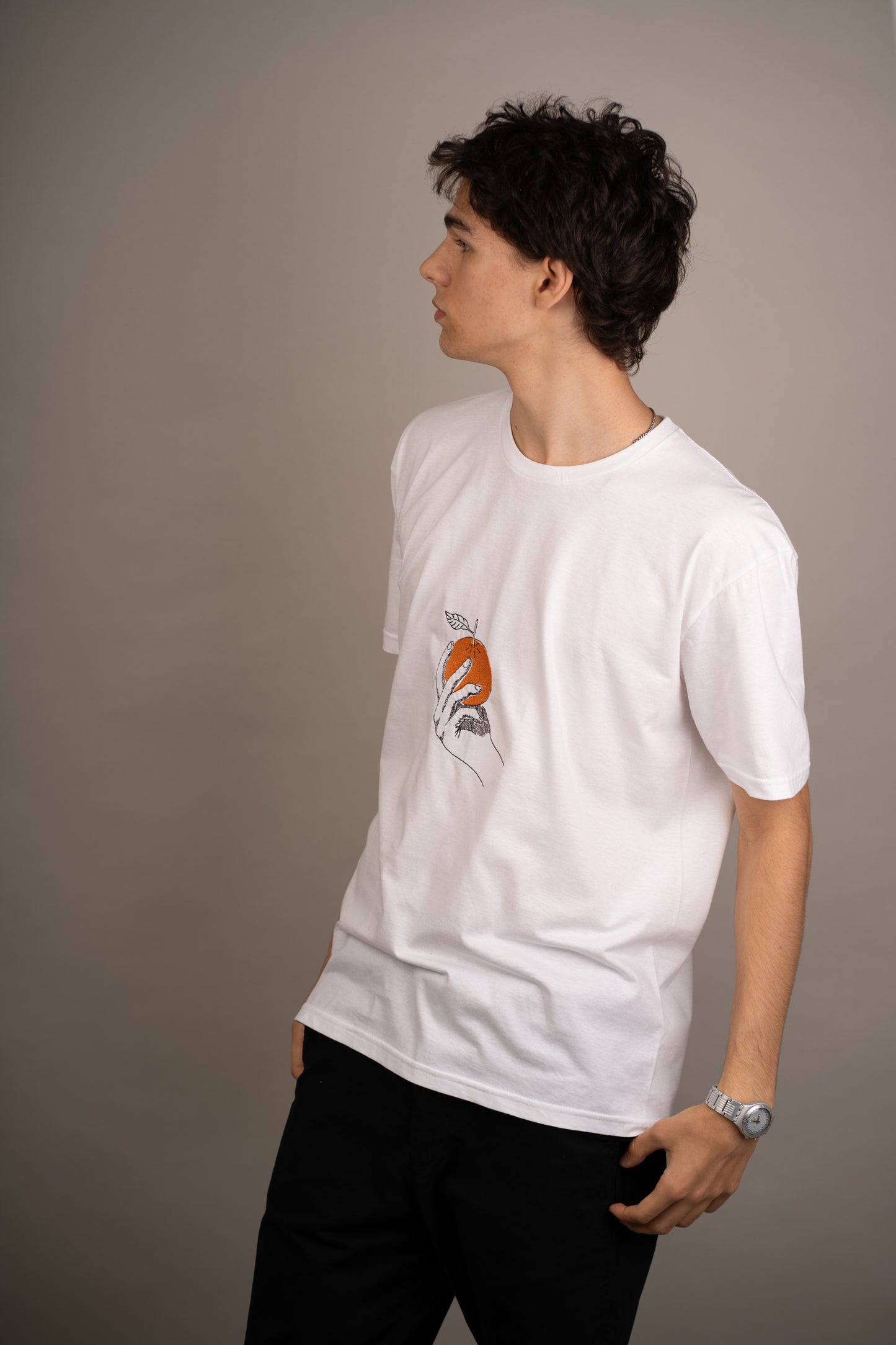 Men's graphic T-shirt with orange embroidery on chest